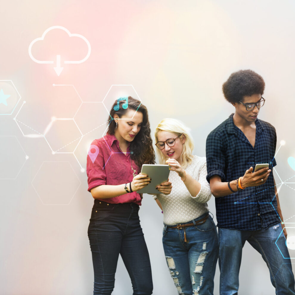 Diverse friends using digital devices